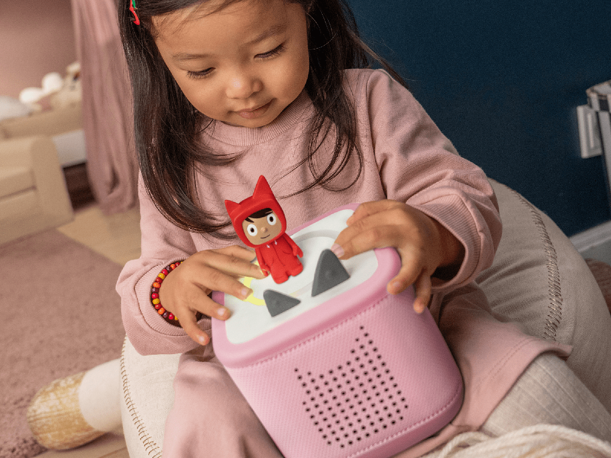 Child Playing With Red Creative-Tonie On A Toniebox 2, An Audio Player For Kids