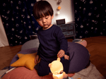 Lifestyle Image of child using Sleepy Friends: Sleepy Bear Night Light Tonie