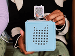 Child playing with Dav Pilkey: Captain Underpants and the Invasion of the Incredibly Naughty Cafeteria Ladies from Outer Space Audiobook
