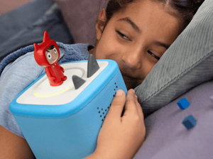 Child enjoying a Tonie and Toniebox 2, an audio player for kids
