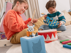 Child Playing With Lalalinos - Akio Audio Figurine And Toniebox 2