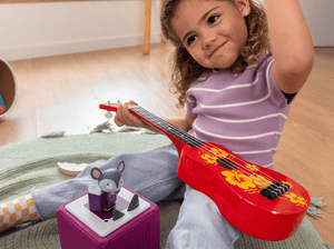 Child Playing With Lalinos - Scout Audio Figurine And Toniebox 2