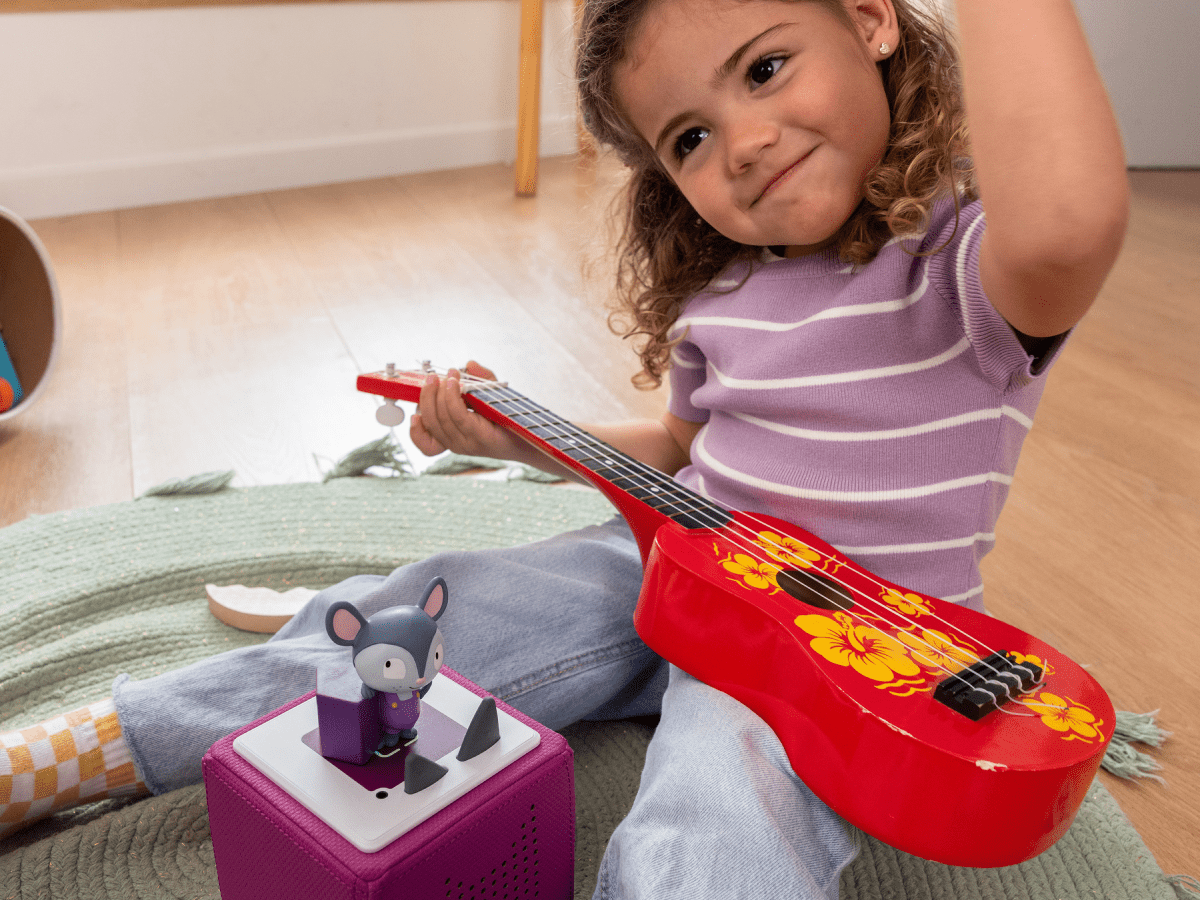 Child Playing With Lalinos - Scout Audio Figurine And Toniebox 2