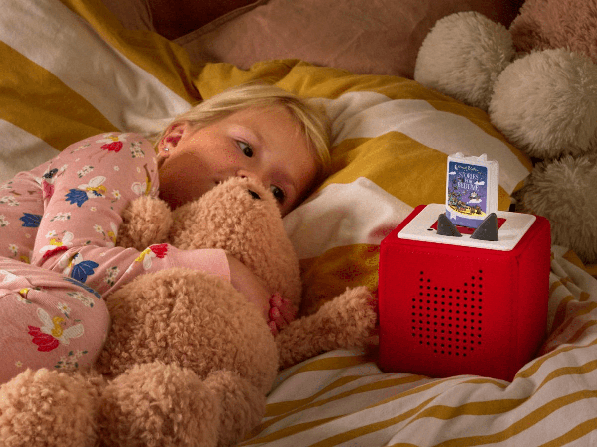 Child playing with Enid Blyton: Stories for Bedtime Audiobook